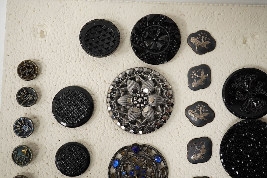 A collection of assorted Victorian and later jet, simulated jet and other decorative buttons, largest 50mm. Condition - good